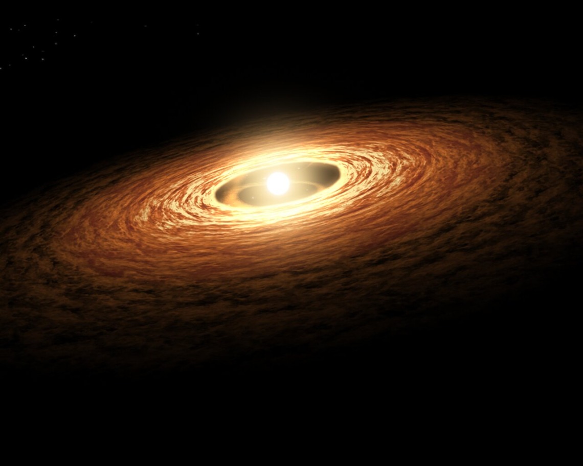 Artist’s impression of a young star surrounded by a rotating disk of gas and dust.