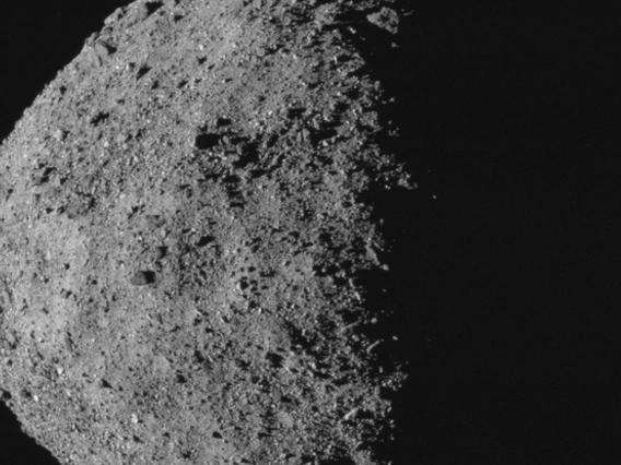 This image, showing asteroid Bennu's spinning-top shape, was taken by the MapCam camera on NASA's OSIRIS-REx spacecraft on April 29, from a distance of 5 miles. From the spacecraft's vantage point, half of Bennu is sunlit and half is in shadow. (Credit: N