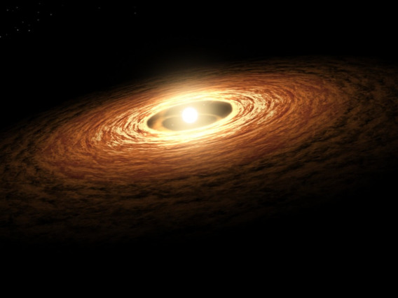 Artist’s impression of a young star surrounded by a rotating disk of gas and dust.