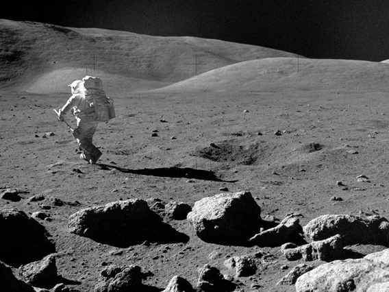 Astronaut walking on the moon.